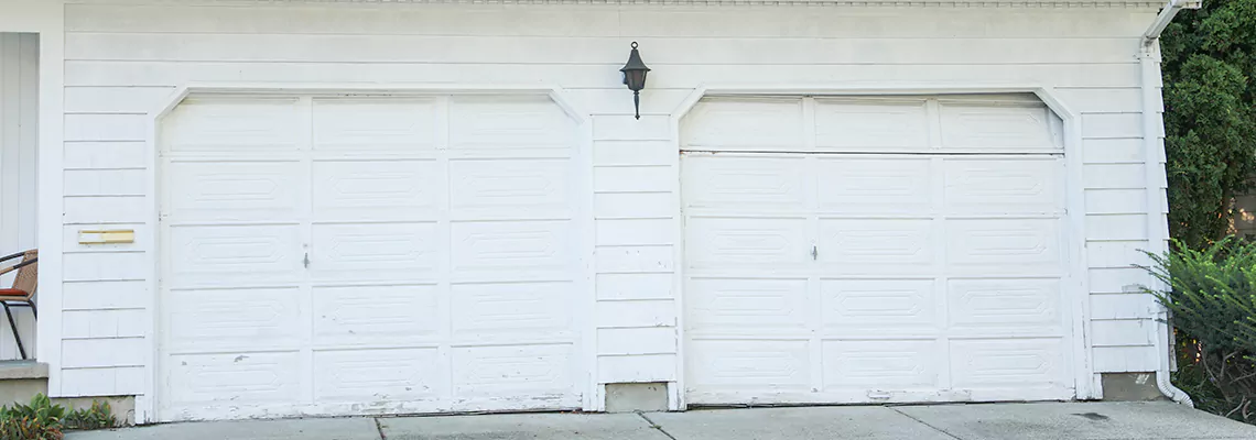 Roller Garage Door Dropped Down Replacement in Miami, FL