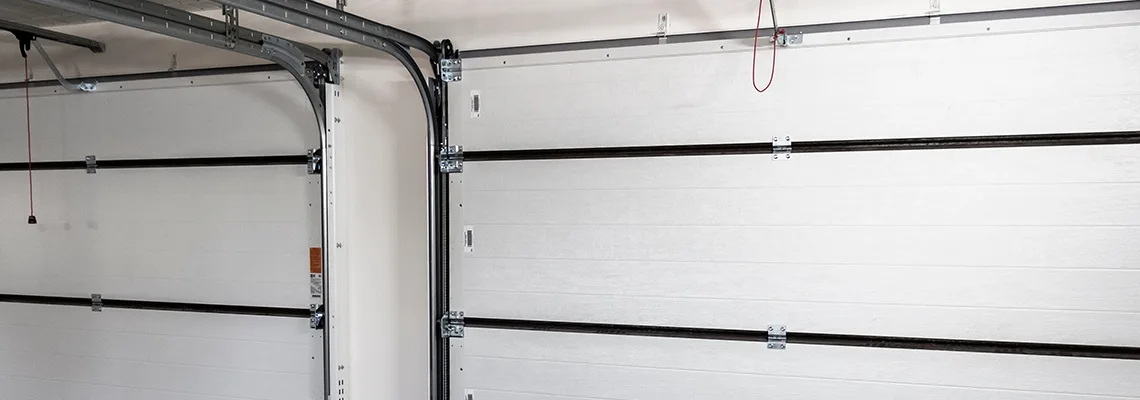 Fix Folding Garage Door Jerking in Miami, Florida